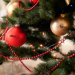 Set of personalised golden glass Christmas baubles